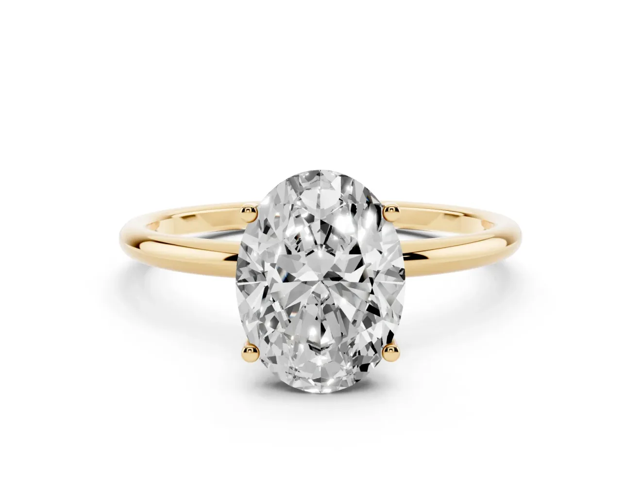 Oval Cut Diamond Solitaire Engagement Ring Set in Yellow gold with Thin Band and Prong Setting