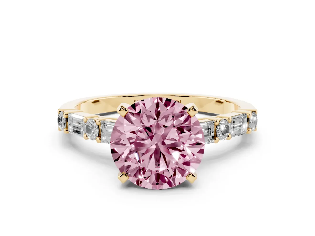 Fancy Pink Round Cut Diamond Solitaire Set in Yellow gold with Side Baguettes and Channel Set Band