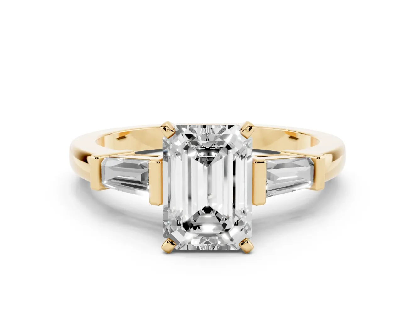 Emerald Cut Diamond Solitaire Ring Set in Yellow gold with Tapered Baguette Accents and Prong Setting