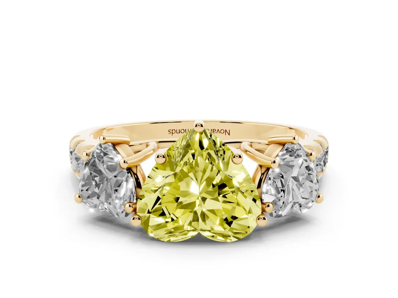 Fancy Yellow Heart Cut Diamond Three-Stone Ring Set in Yellow gold with Pavé Band