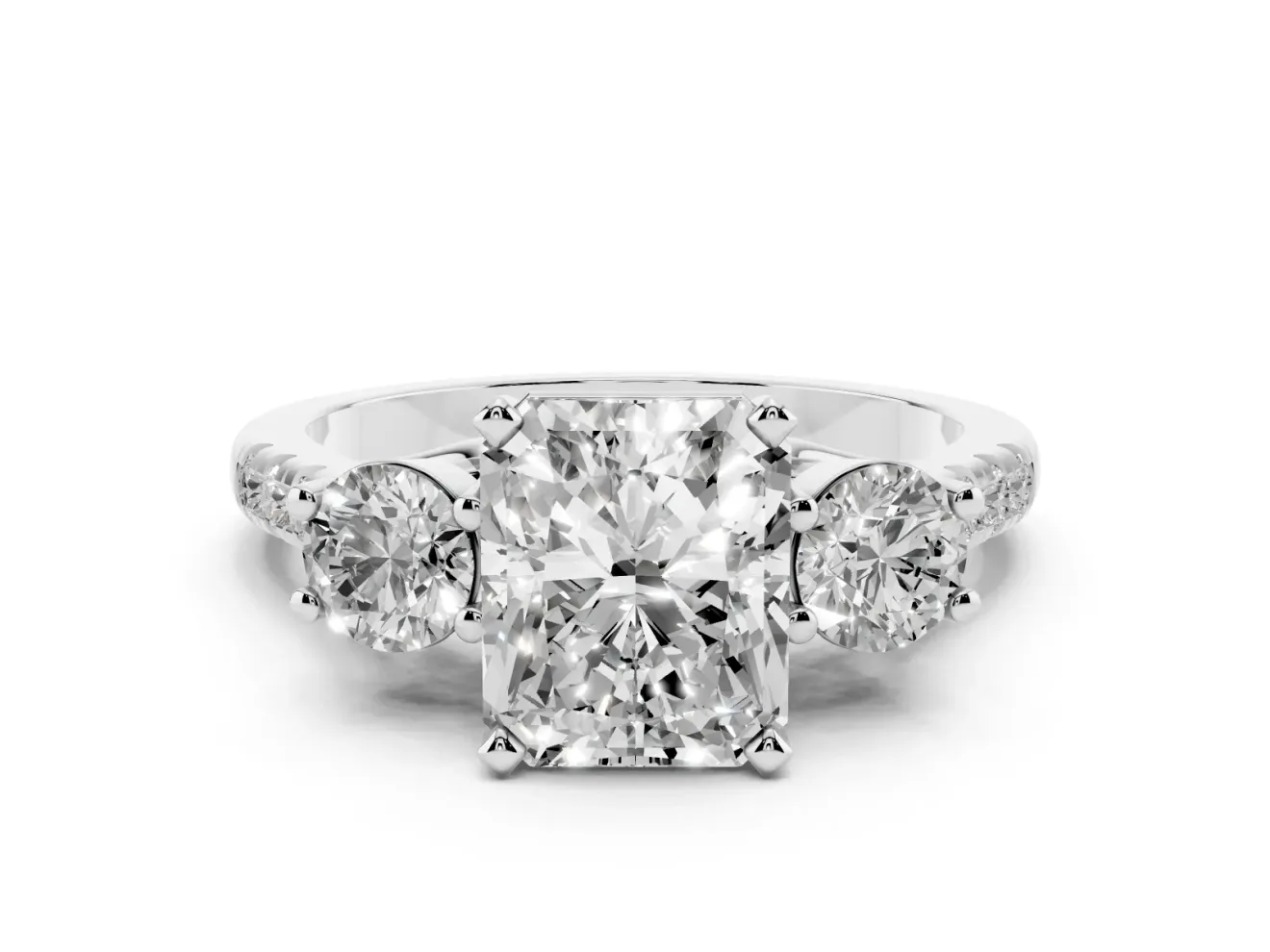 Three-Stone Radiant Cut Diamond Pavé Band Ring Set in White gold with Prong-Set Trio