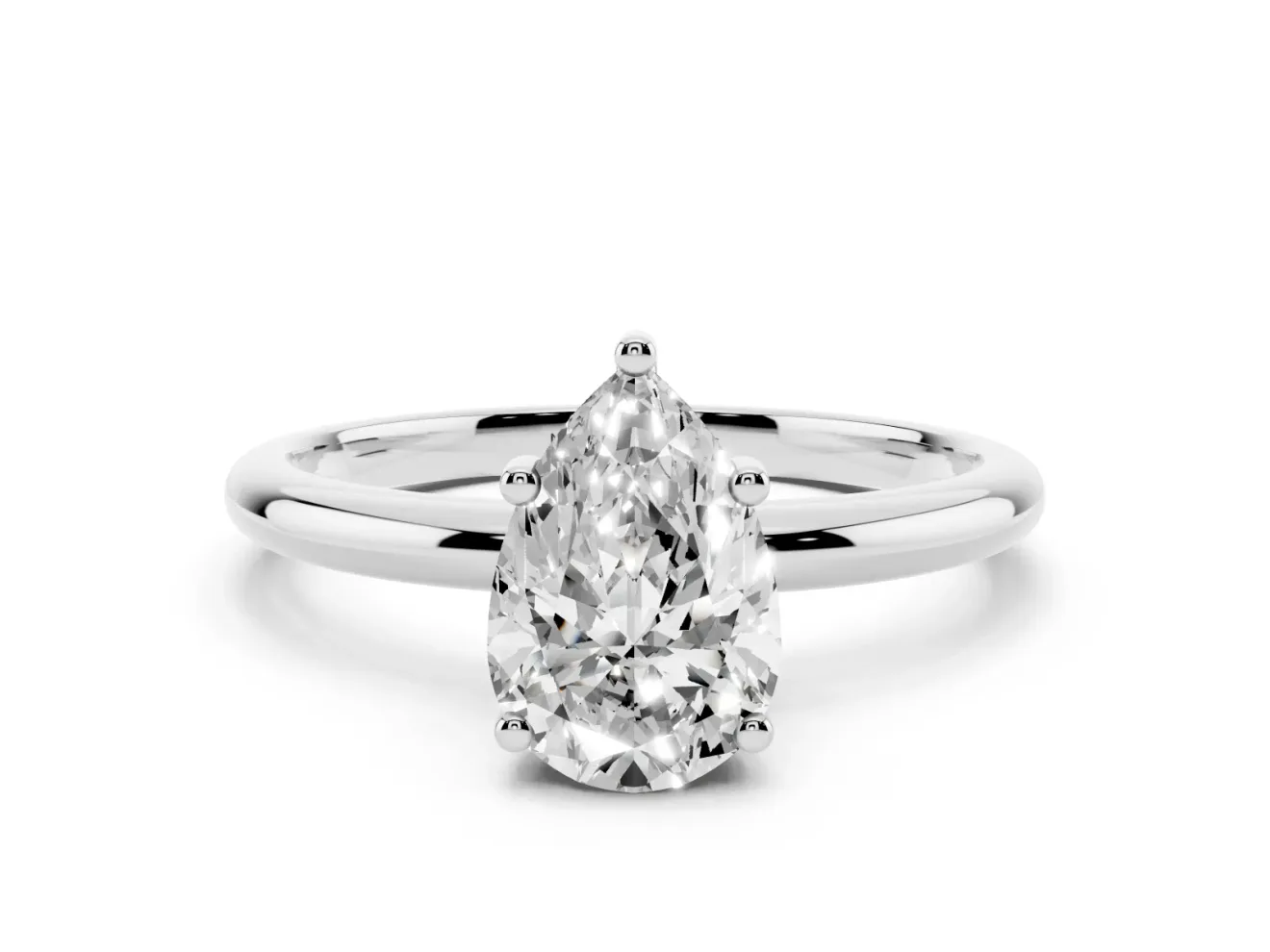 Pear Cut Diamond Solitaire Engagement Ring Set in Silver with Prong Setting and Polished Band