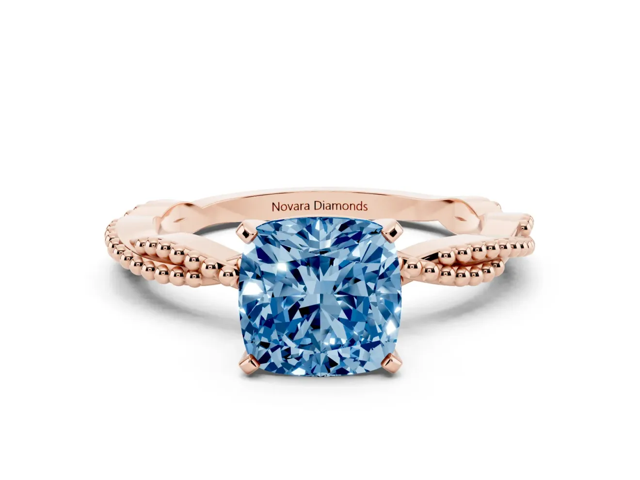 Fancy Blue Cushion Cut Diamond Solitaire Ring Set in Rose gold with Twisted Band and Bead Prong Setting