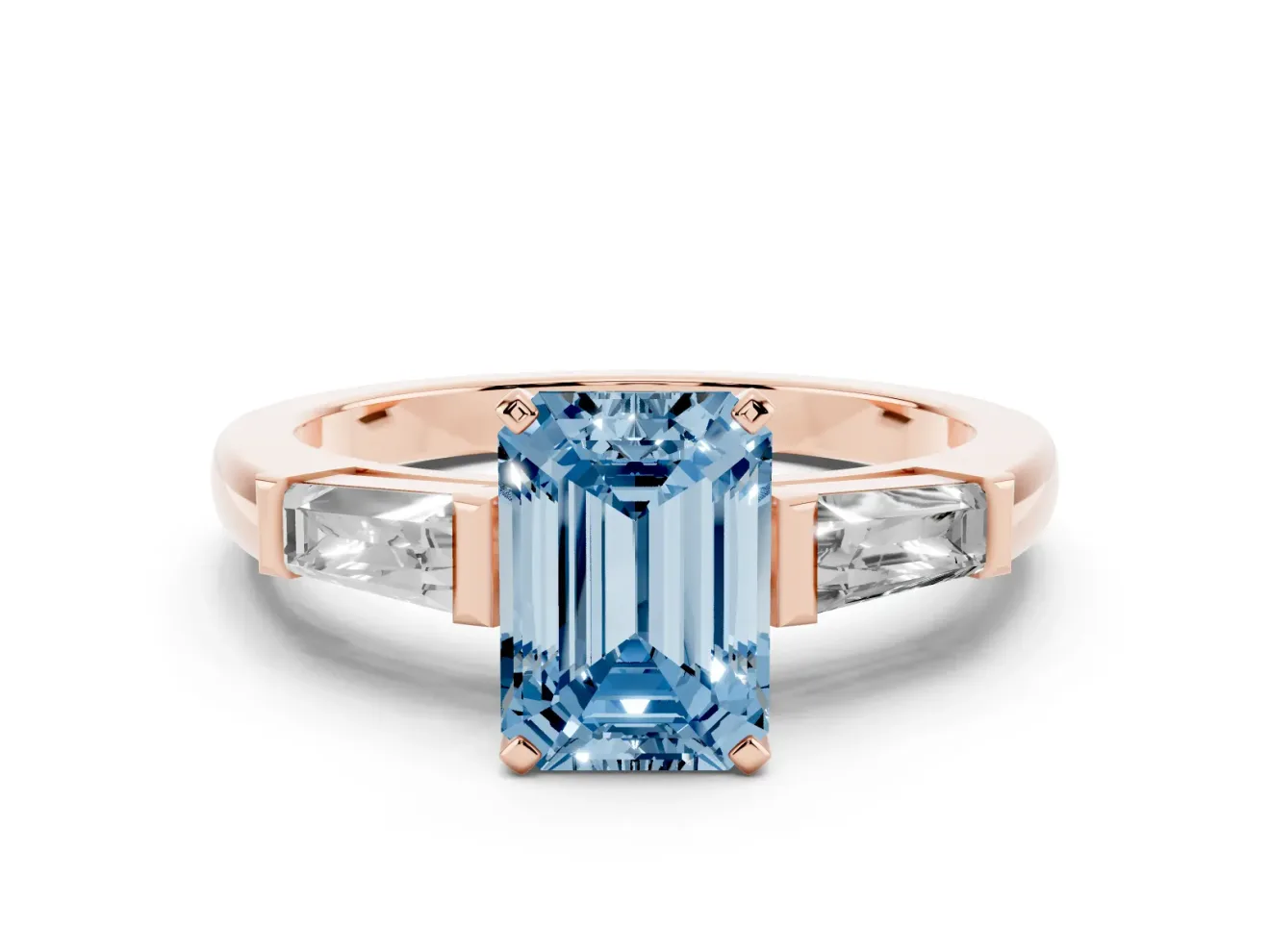 Fancy Blue Emerald Cut Diamond Solitaire Ring Set in Rose gold with Tapered Baguette Side Stones and Prong Setting