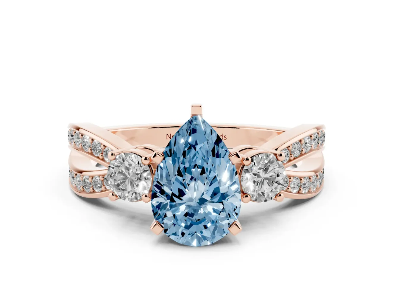 Fancy Blue Three-Stone Pear Cut Diamond Twist Band Ring Set in Rose gold with Pavé Accents and Prong Setting