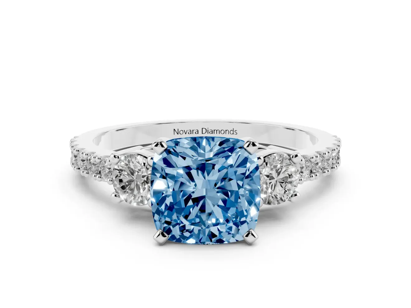 Cushion Cut Three Stone Pavé Engagement Ring Setting for a Fancy Blue Lab-Grown Diamond | Round Side Stones | Platinum