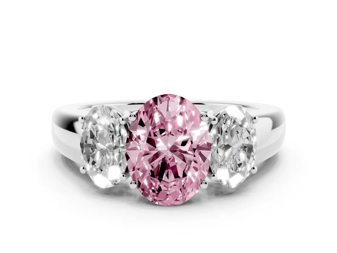 Fancy Pink Three-Stone Oval Cut Diamond Ring Set in White gold with Matching Prong Settings and Plain Band