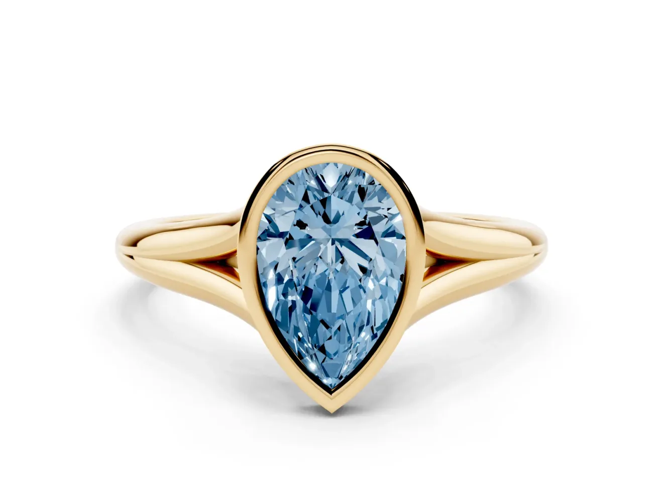 Fancy Blue Bezel Set Pear Cut Diamond Solitaire Ring Set in Yellow gold with Tapered Band