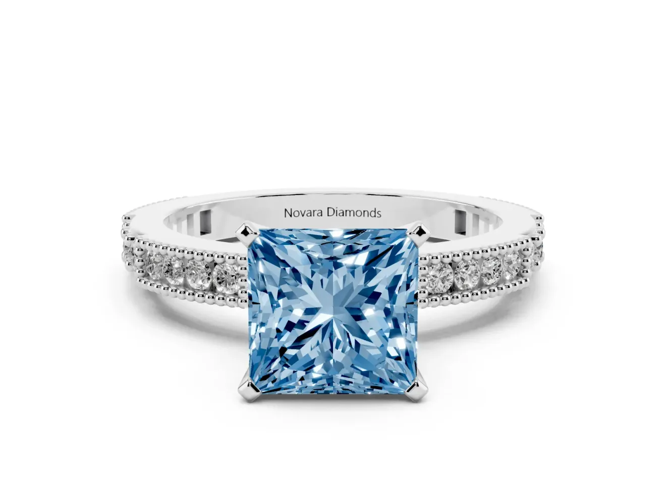 Fancy Blue Princess Cut Diamond Solitaire Ring Set in White gold with Slim Pavé Band and Prong Setting