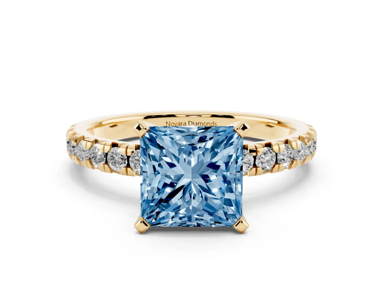 Fancy Blue Princess Cut Diamond Solitaire Pavé Engagement Ring Set in Yellow gold with Round Band and Prong Setting