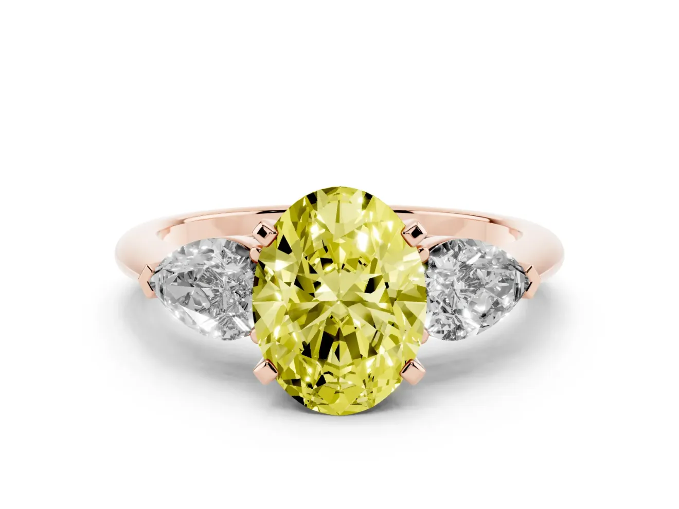 Fancy Yellow Three-Stone Oval Cut Diamond Ring Set in Rose gold with Pear Side Stones and Prong Setting