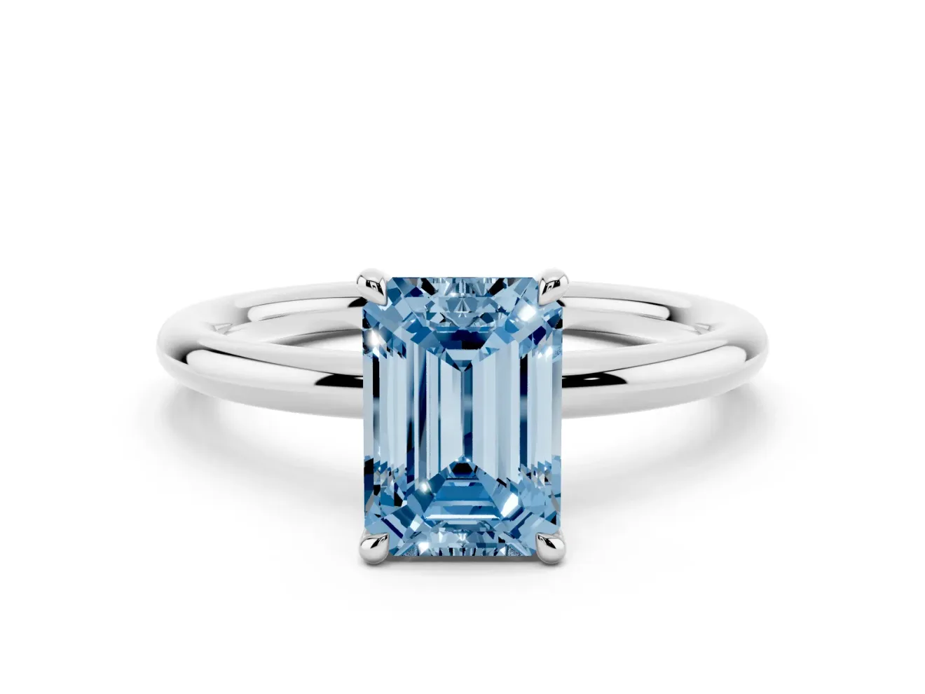 Fancy Blue Emerald Cut Diamond Solitaire Ring Set in Silver with Thin Band and Prong Setting