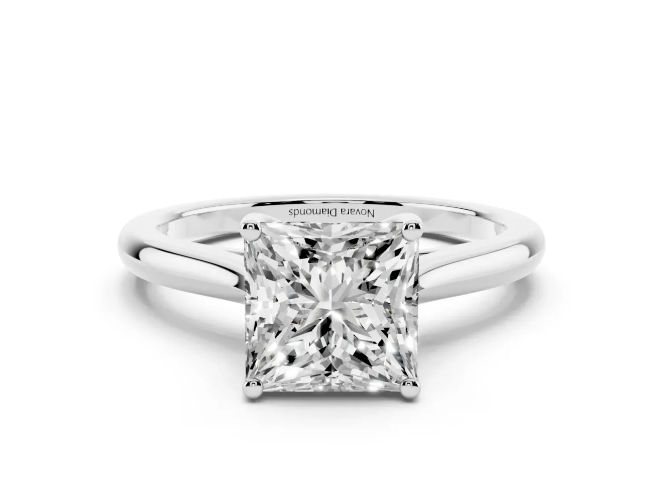 Princess Cut Diamond Solitaire Ring Set in White gold with Cathedral Band and Prong Setting