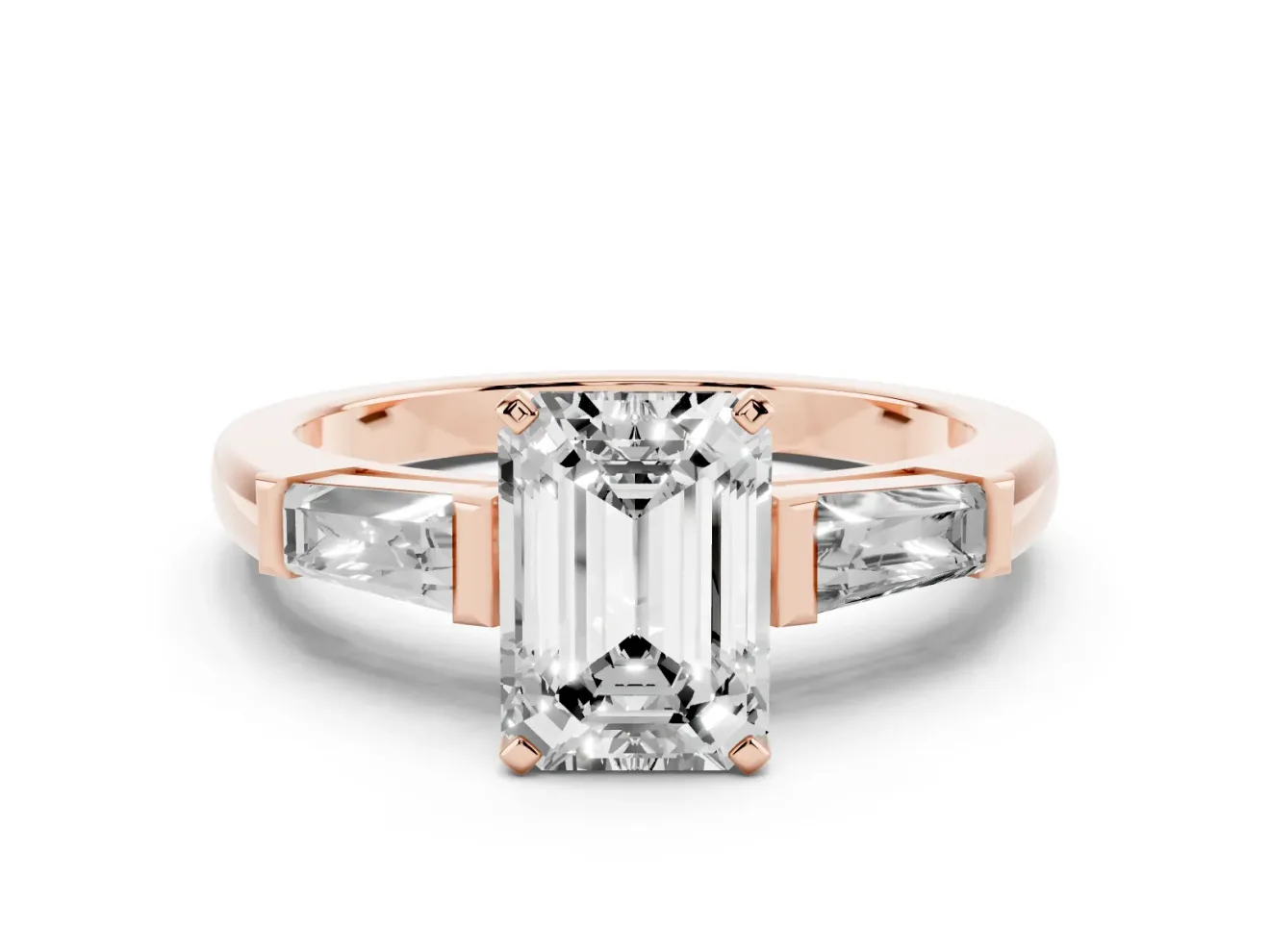 Emerald Cut Diamond Solitaire Ring Set in Rose gold with Tapered Baguette Side Stones and Prong Setting