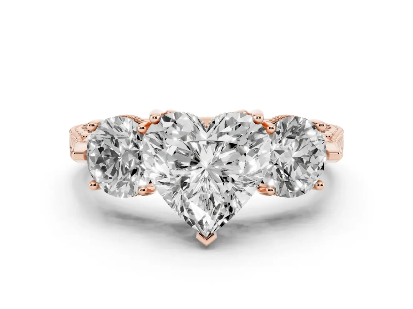 Heart Cut Diamond Three-Stone Ring Set in Rose gold with Milgrain Band