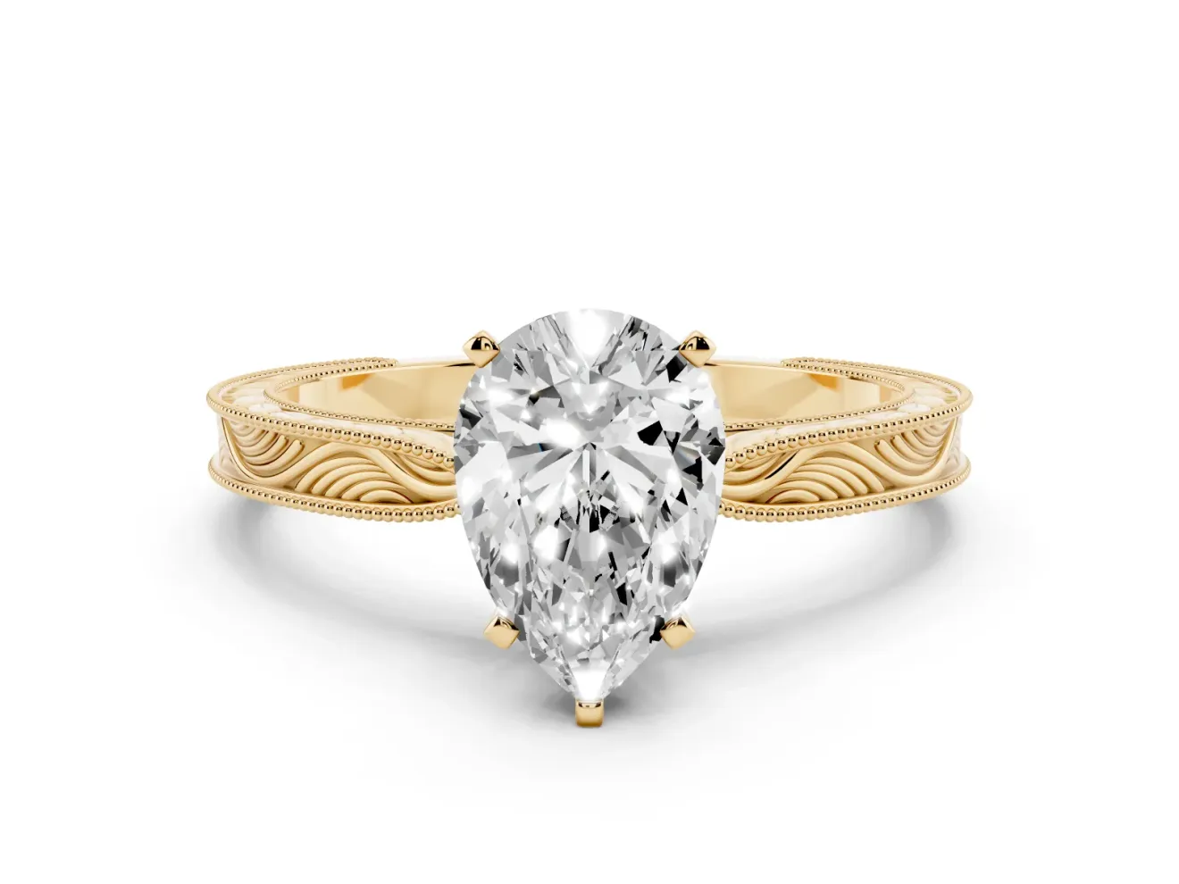 Pear Cut Diamond Solitaire Milgrain Engraved Band Set in Yellow gold with Prong Setting