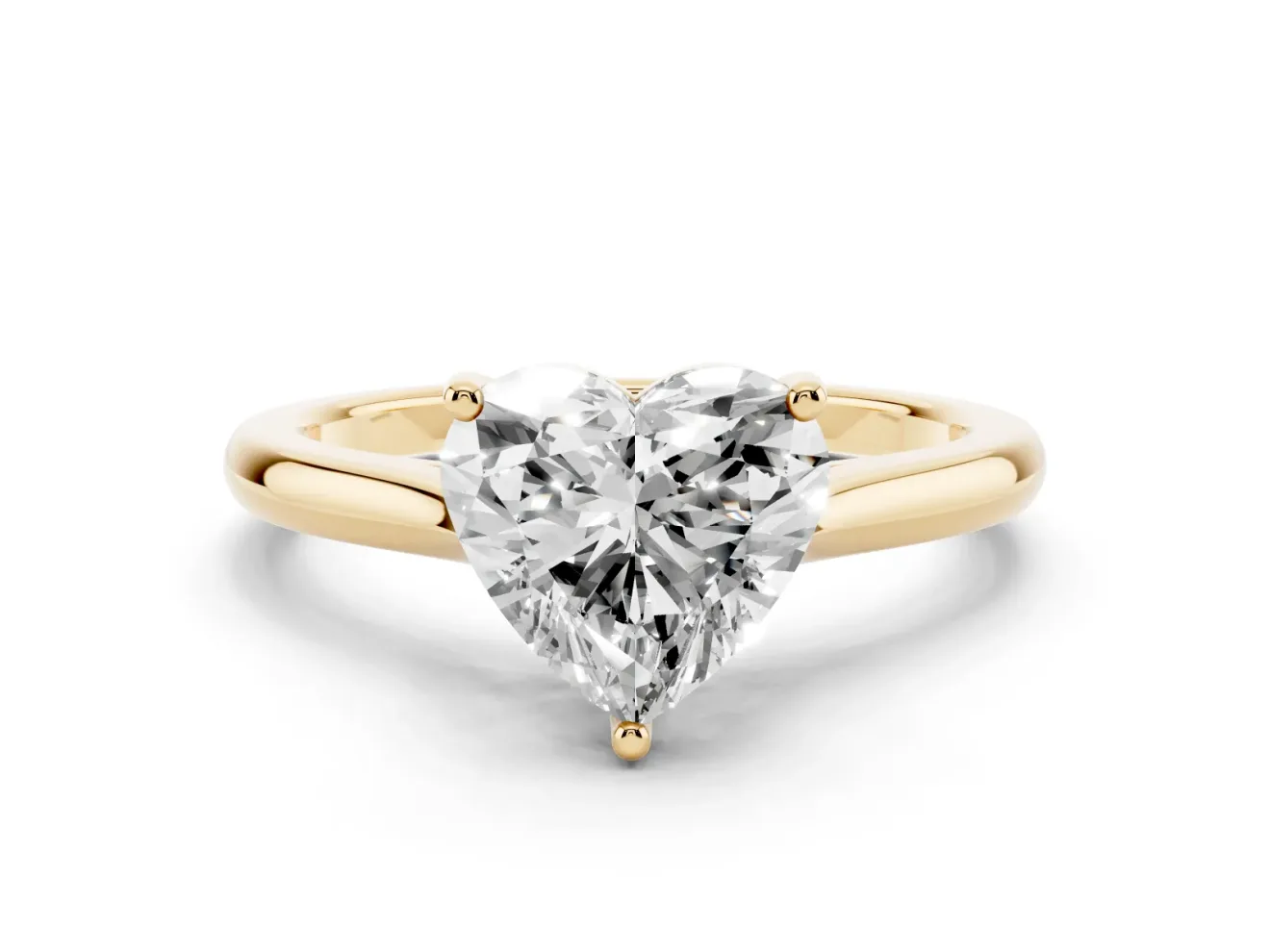 Heart Cut Diamond Solitaire Ring Set in Yellow gold with Cathedral Band and Prong Setting