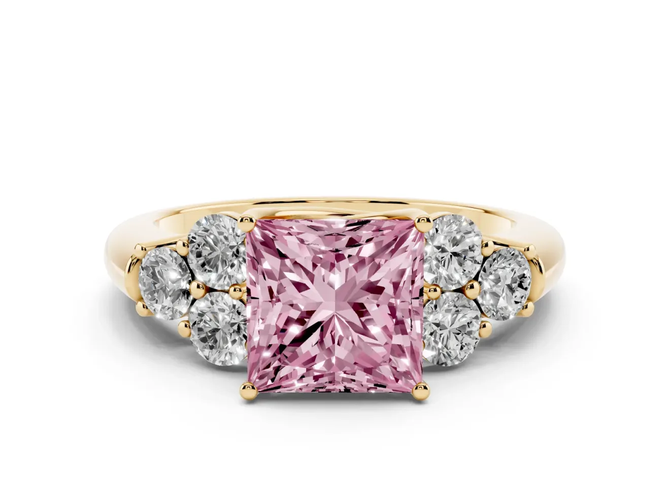 Fancy Pink Princess Cut Diamond Cluster Ring Set in Yellow gold with Round Accent Stones and Prong Setting on a Plain Band