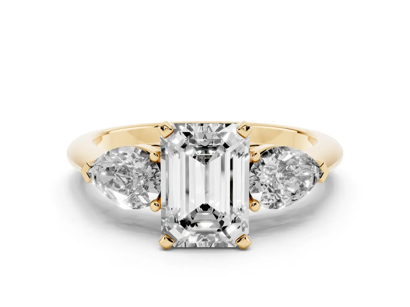 Emerald Cut Three-Stone Engagement Ring Setting | Pear Side Stones | Yellow Gold