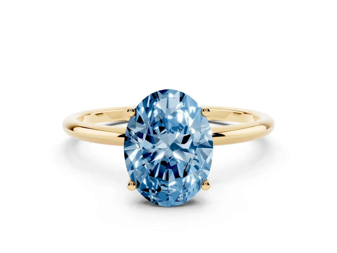 Fancy Blue Oval Cut Diamond Solitaire Engagement Ring Set in Yellow gold with Thin Band and Prong Setting