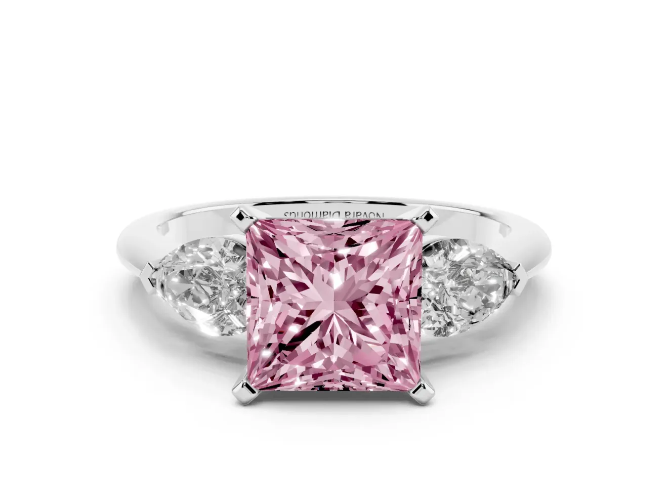 Fancy Pink Three-Stone Princess Cut Diamond Ring Set in White gold with Pear Side Stones and Prong Setting