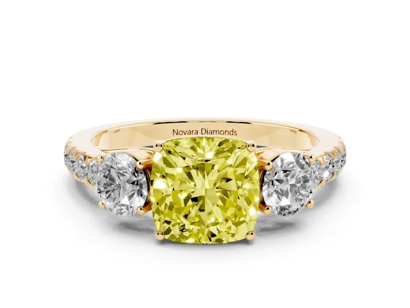 Fancy Yellow Cushion Cut Diamond Three-Stone Ring Set in Yellow gold with Round Side Stones and Delicate Pavé Band