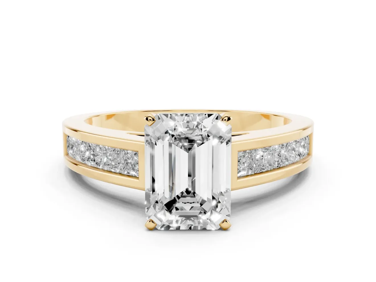 Emerald Cut Diamond Solitaire Ring Set in Yellow gold with Channel-Set Band and Prong Setting