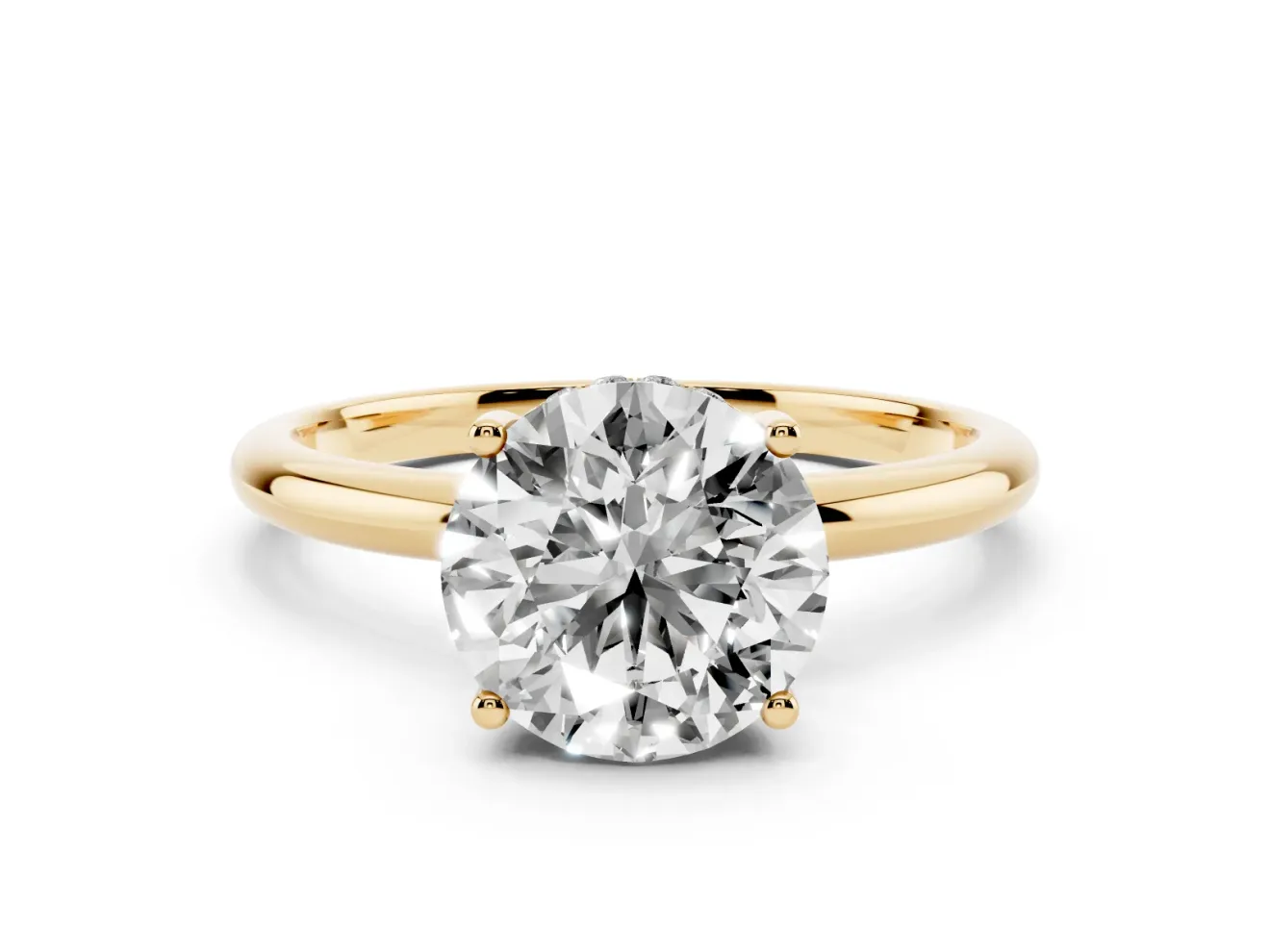 Round Cut Diamond Solitaire Engagement Ring Set in Yellow gold with Prong Setting and Polished Band