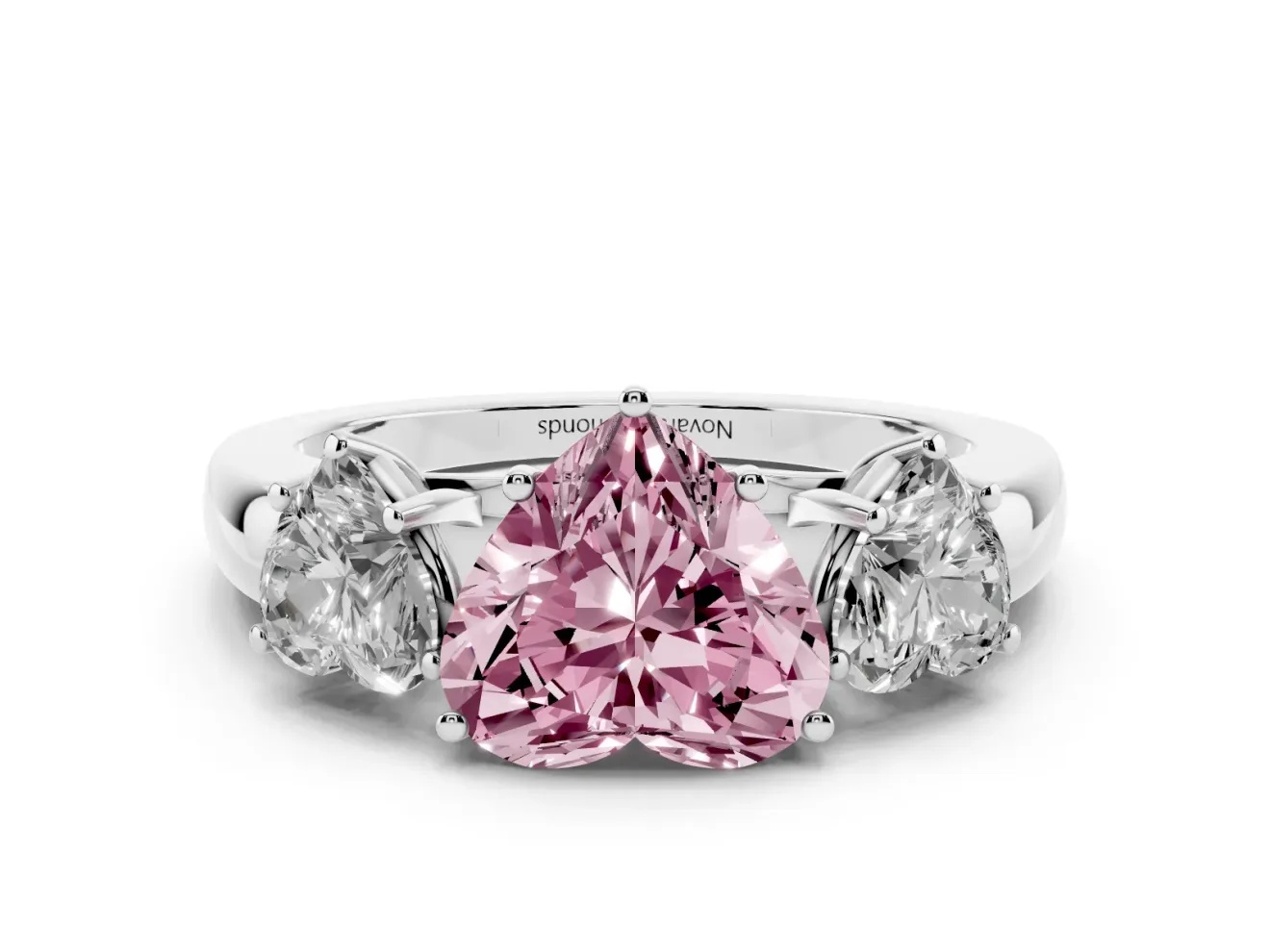 Fancy Pink Heart Cut Diamond Three-Stone Ring Set in White gold with Bold Center and Classic Band
