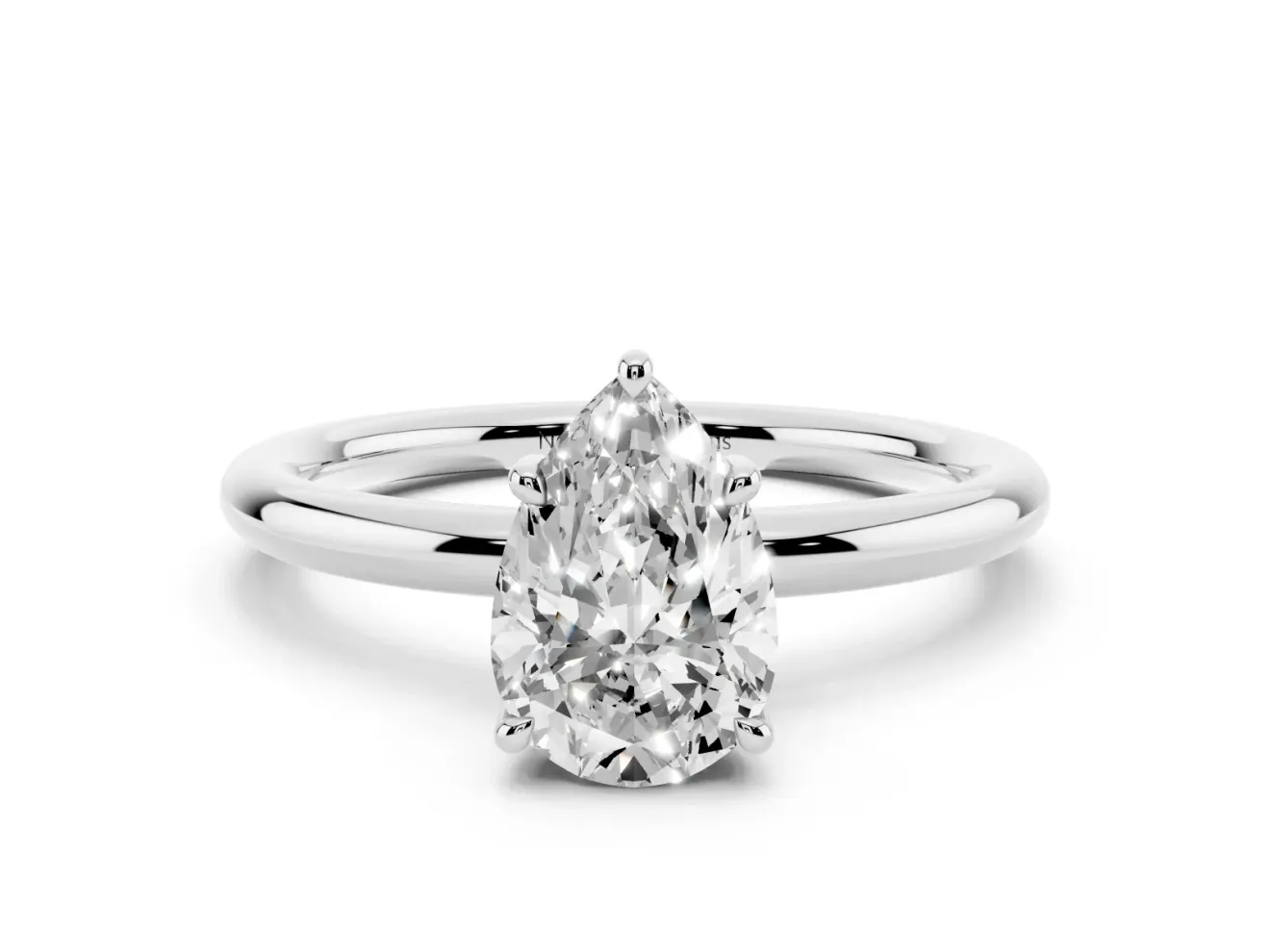 Pear Cut Diamond Solitaire Ring Set in Platinum with Thin Band and Prong Setting