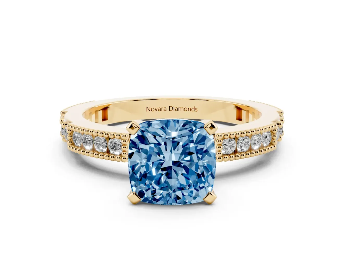 Fancy Blue Cushion Cut Diamond Solitaire Ring Set in Yellow gold with Slim Pavé Band and Prong Setting