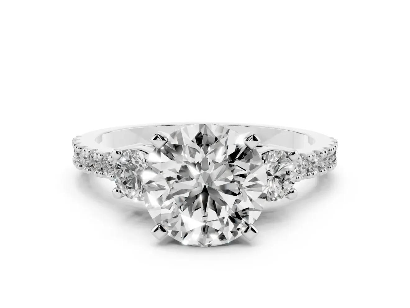 Three-Stone Round Cut Diamond Pavé Band Ring Set in White gold with Prong Setting