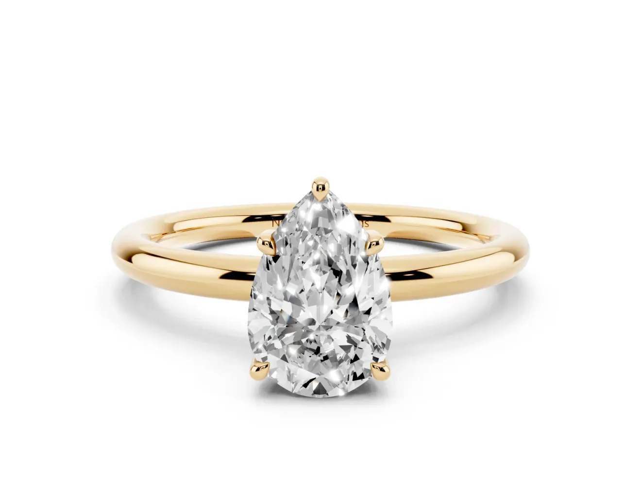Pear Cut Diamond Solitaire Ring Set in Yellow gold with Thin Band and Prong Setting