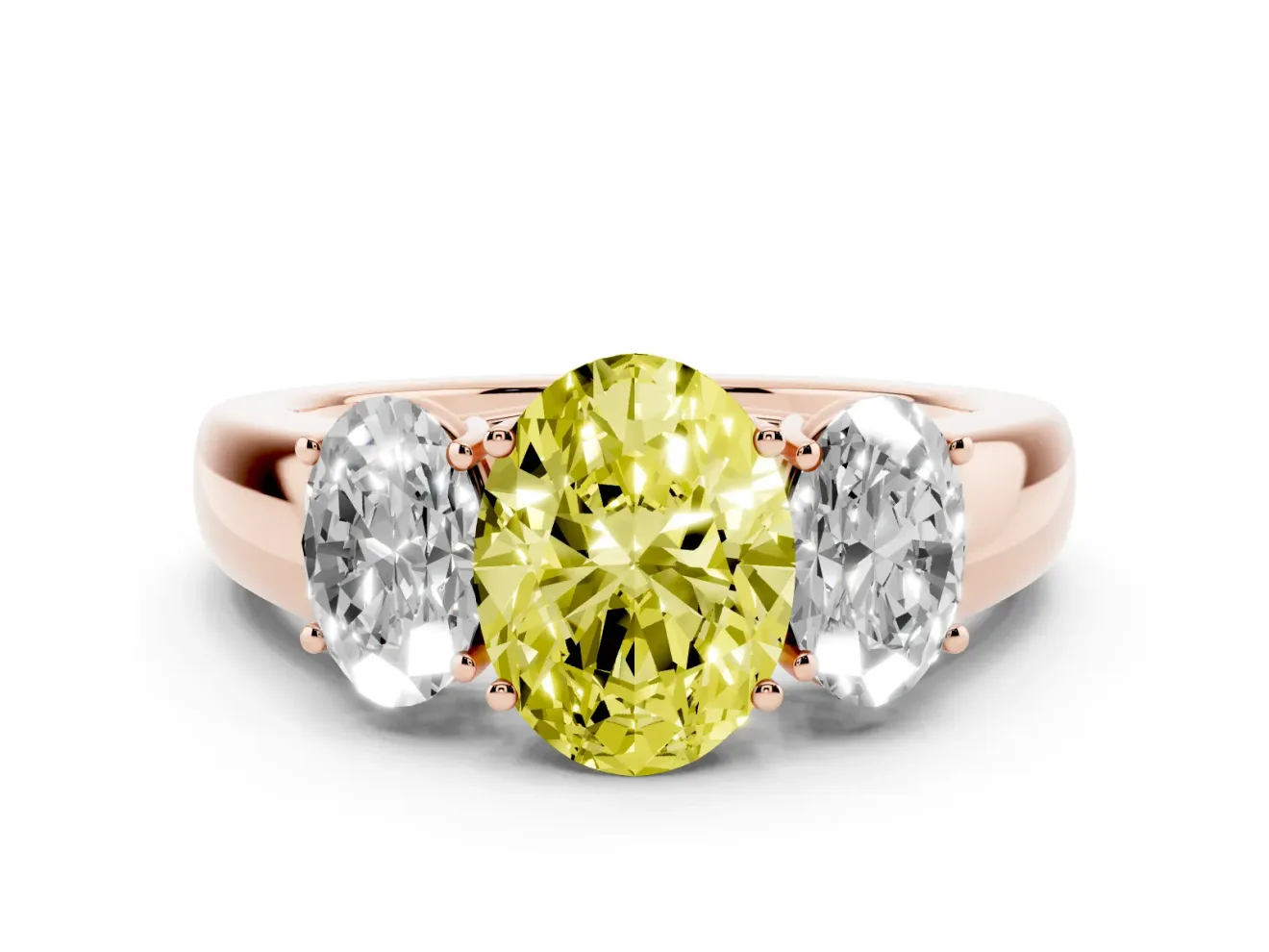 Fancy Yellow Three-Stone Oval Cut Diamond Ring Set in Rose gold with Matching Prong Settings and Plain Band