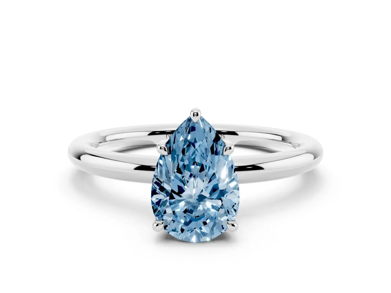 Fancy Blue Pear Cut Diamond Solitaire Ring Set in Silver with Thin Band and Prong Setting