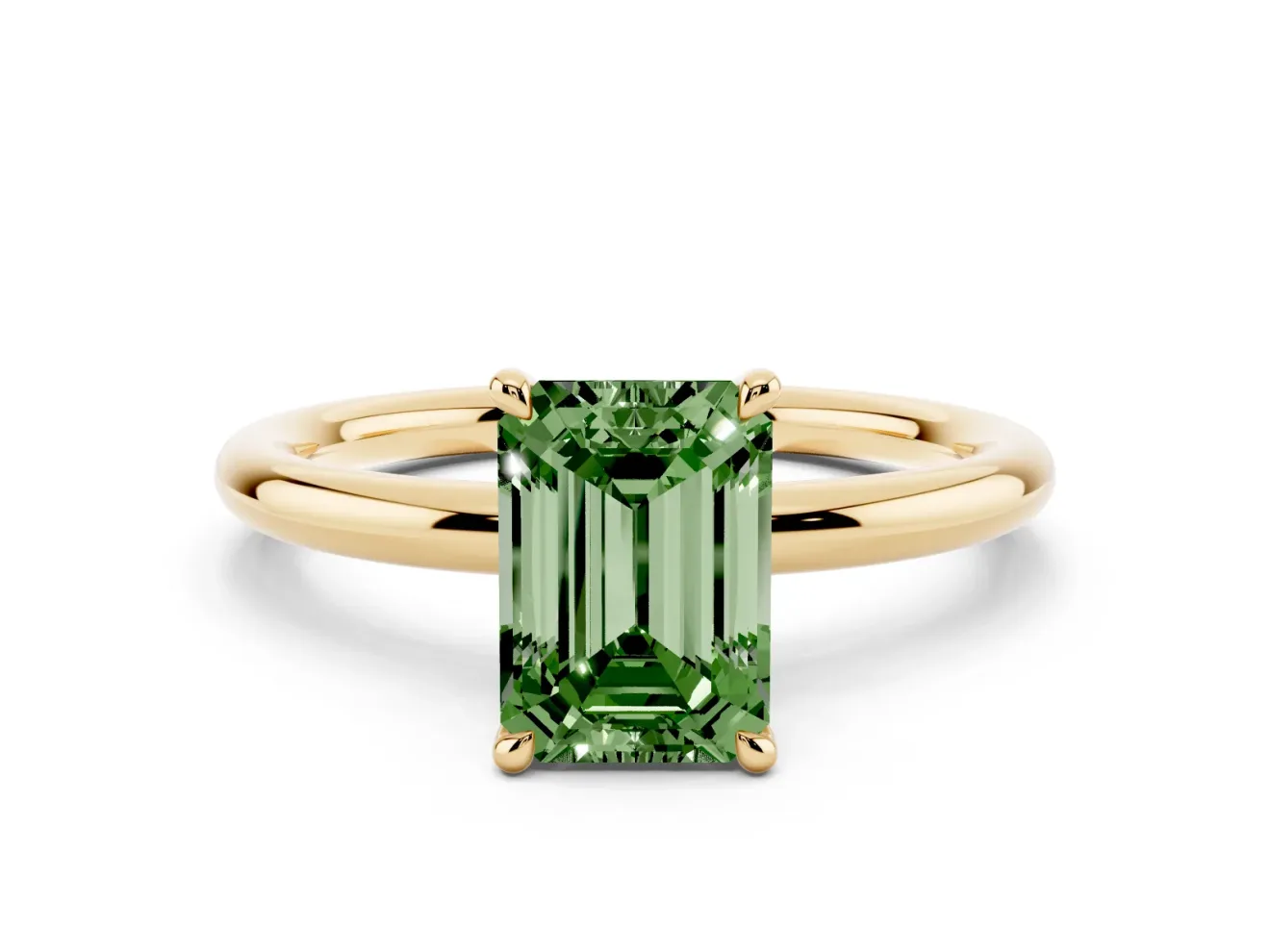 Fancy Green Emerald Cut Diamond Solitaire Ring Set in Yellow gold with Thin Band and Prong Setting