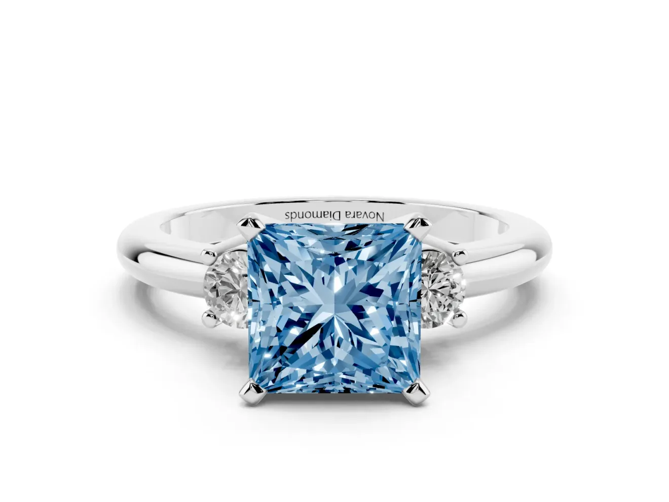 Fancy Blue Three-Stone Princess Cut Diamond Ring Set in Platinum with Prong Setting and Plain Band