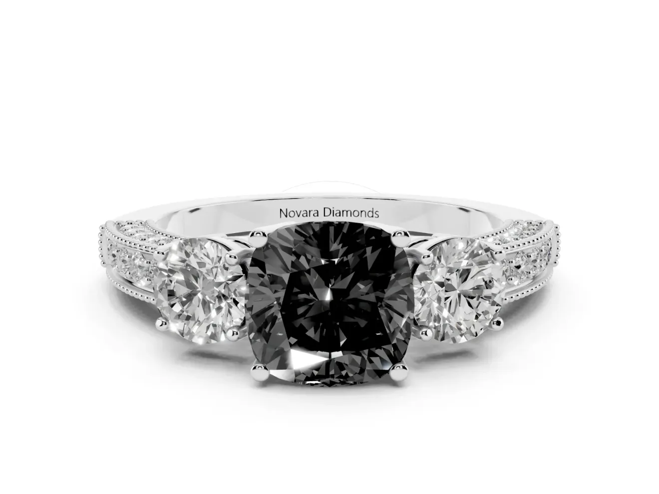 Fancy Black Cushion Cut Diamond Three-Stone Ring Set in Platinum with Round Side Stones and Pavé Band