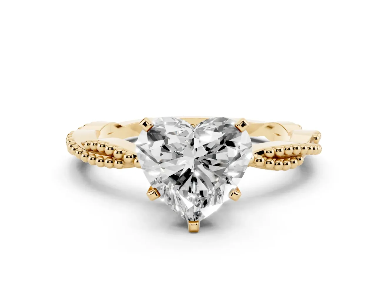 Heart Cut Diamond Solitaire Ring Set in Yellow gold with Twisted Band and Bead Prong Setting