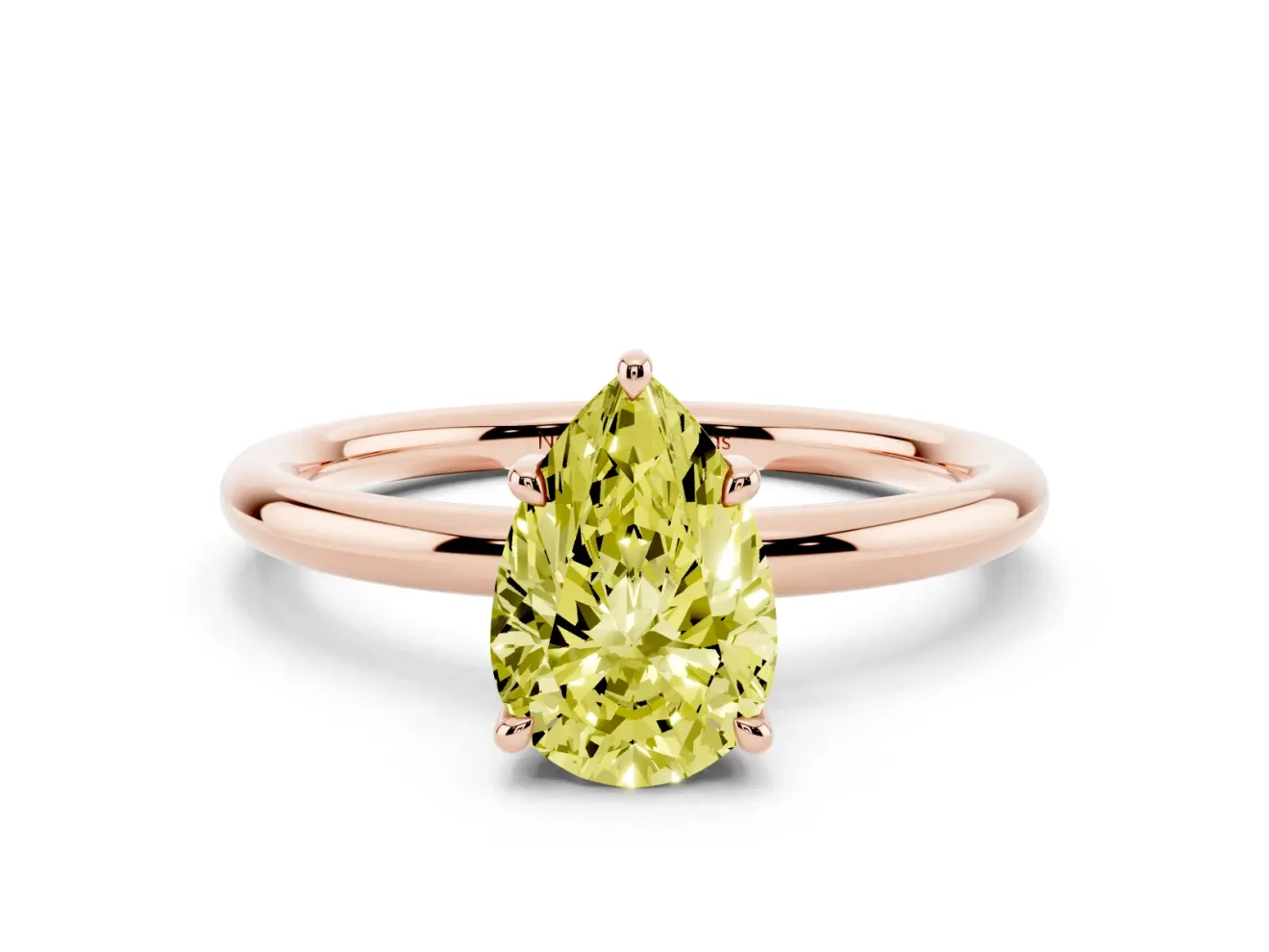 Fancy Yellow Pear Cut Diamond Solitaire Ring Set in Rose gold with Thin Band and Prong Setting