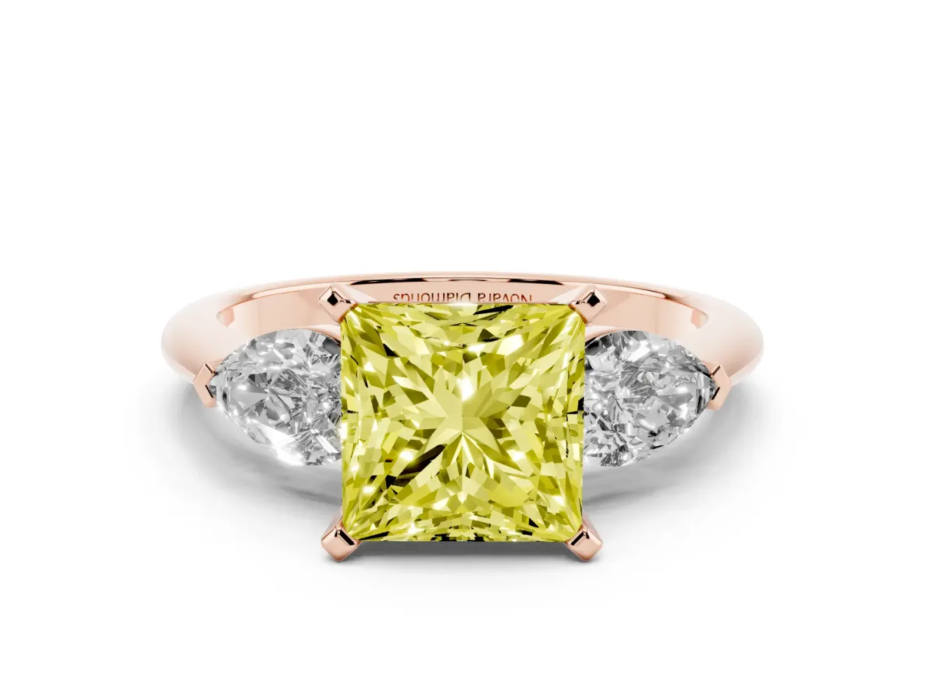Fancy Yellow Three-Stone Princess Cut Diamond Ring Set in Rose gold with Pear Side Stones and Prong Setting
