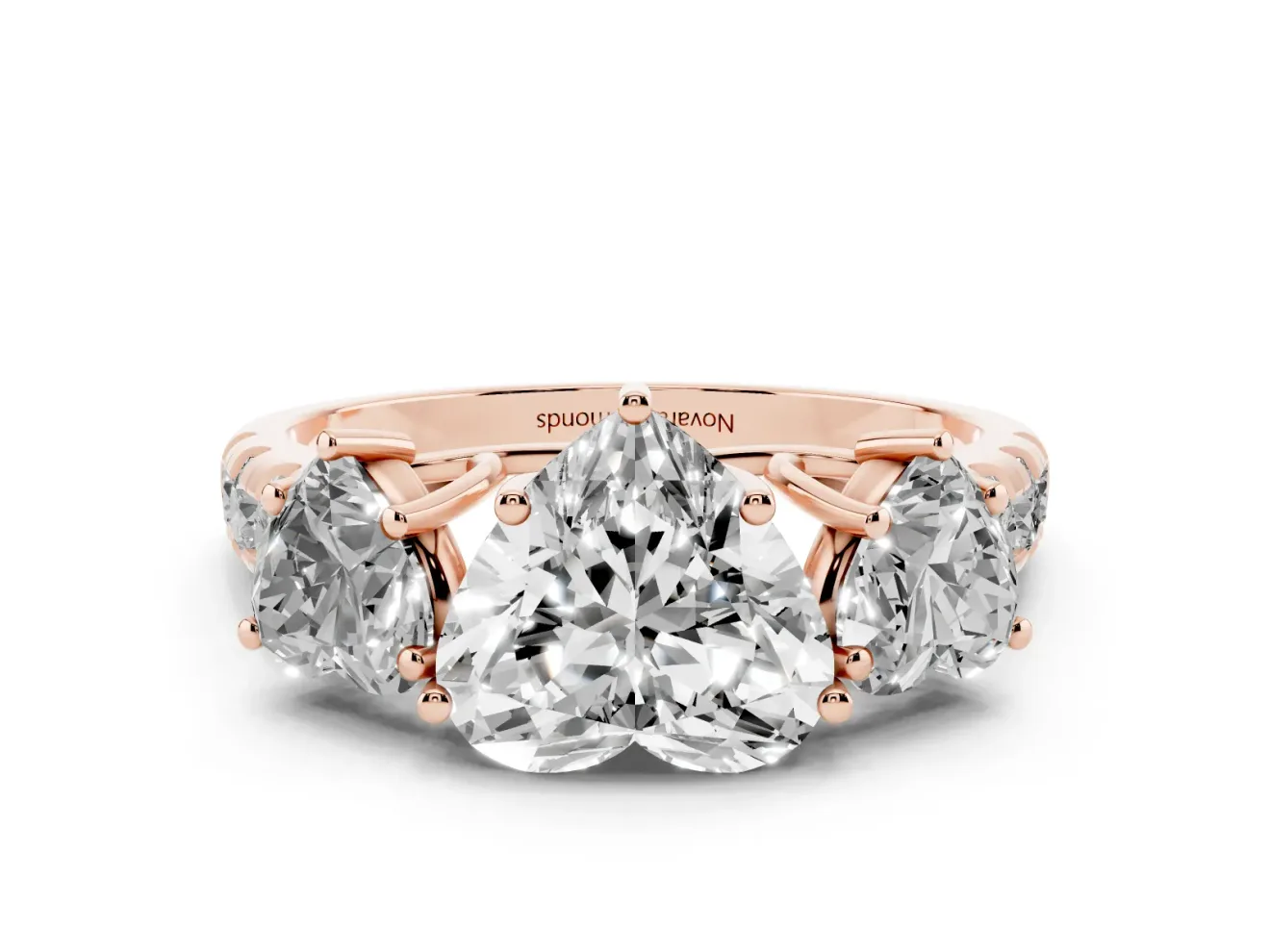 Heart Cut Diamond Three-Stone Ring Set in Rose gold with Pavé Band