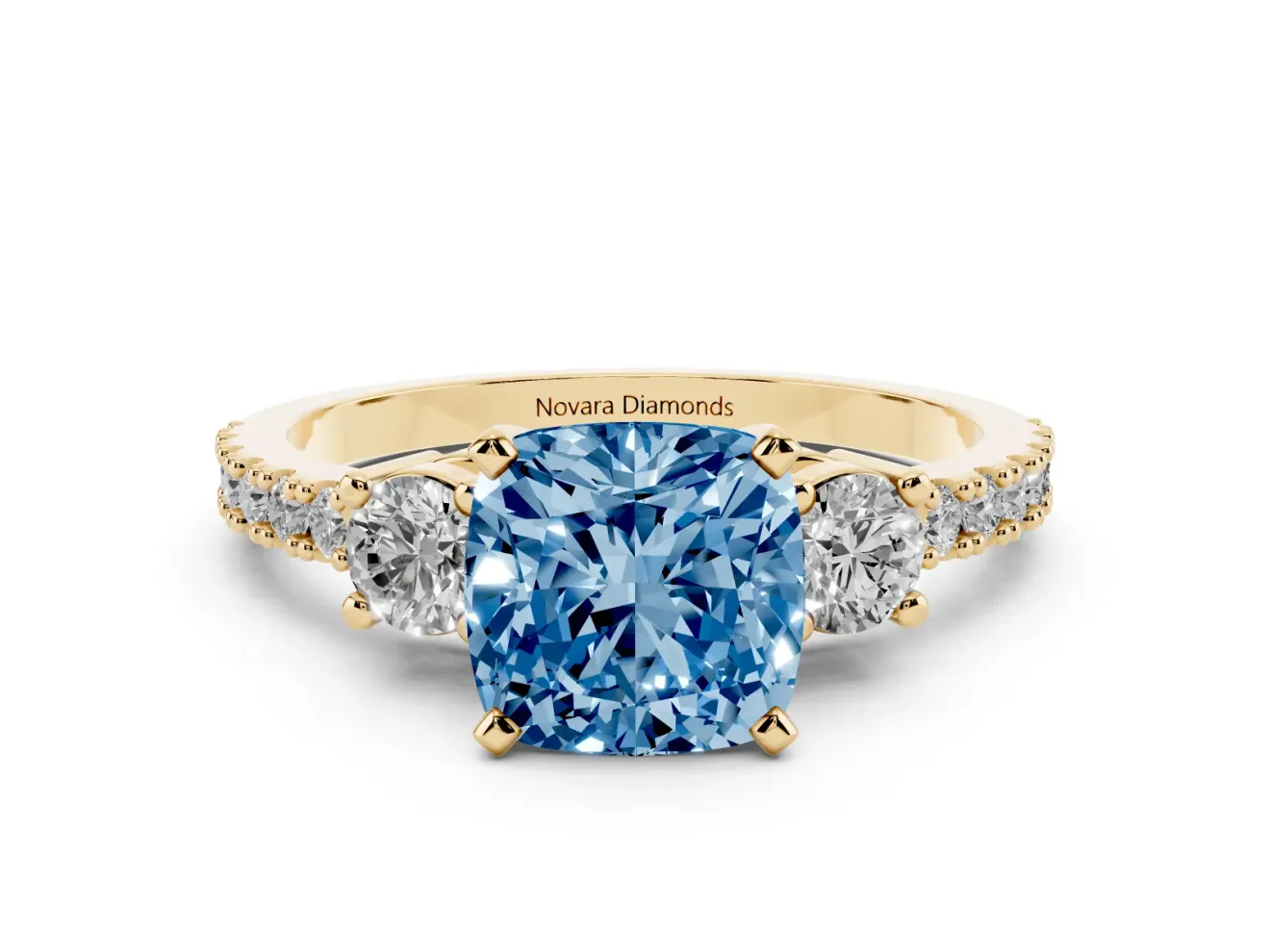 Cushion Cut Three Stone Engagement Ring Setting for a Fancy Blue Lab-Grown Diamond | Pavé Band | Yellow Gold