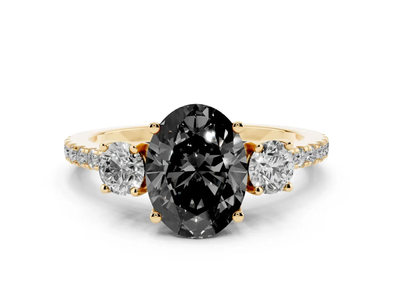 Fancy Black Oval Cut Diamond Three-Stone Ring Set in Yellow gold with Pavé Band and Graduated Sides