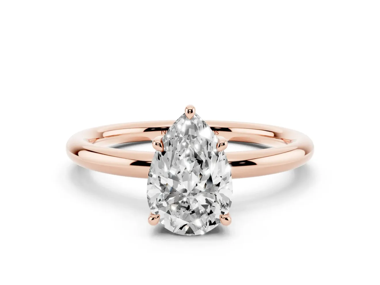 Pear Cut Diamond Solitaire Ring Set in Rose gold with Thin Band and Prong Setting