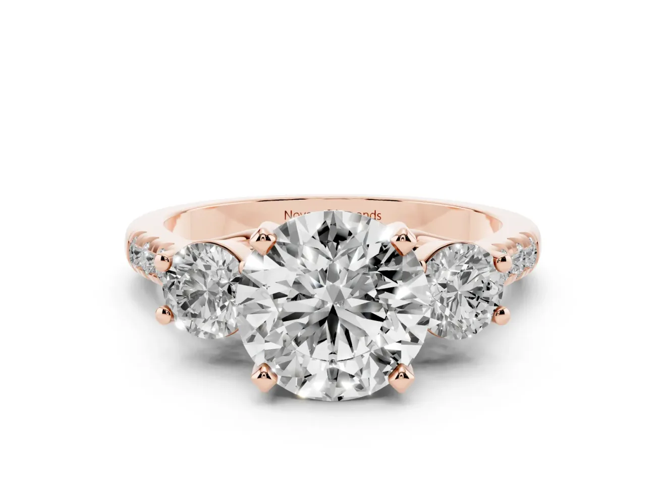 Three-Stone Round Cut Diamond Pavé Band Ring Set in Rose gold with Prong-Set Trio