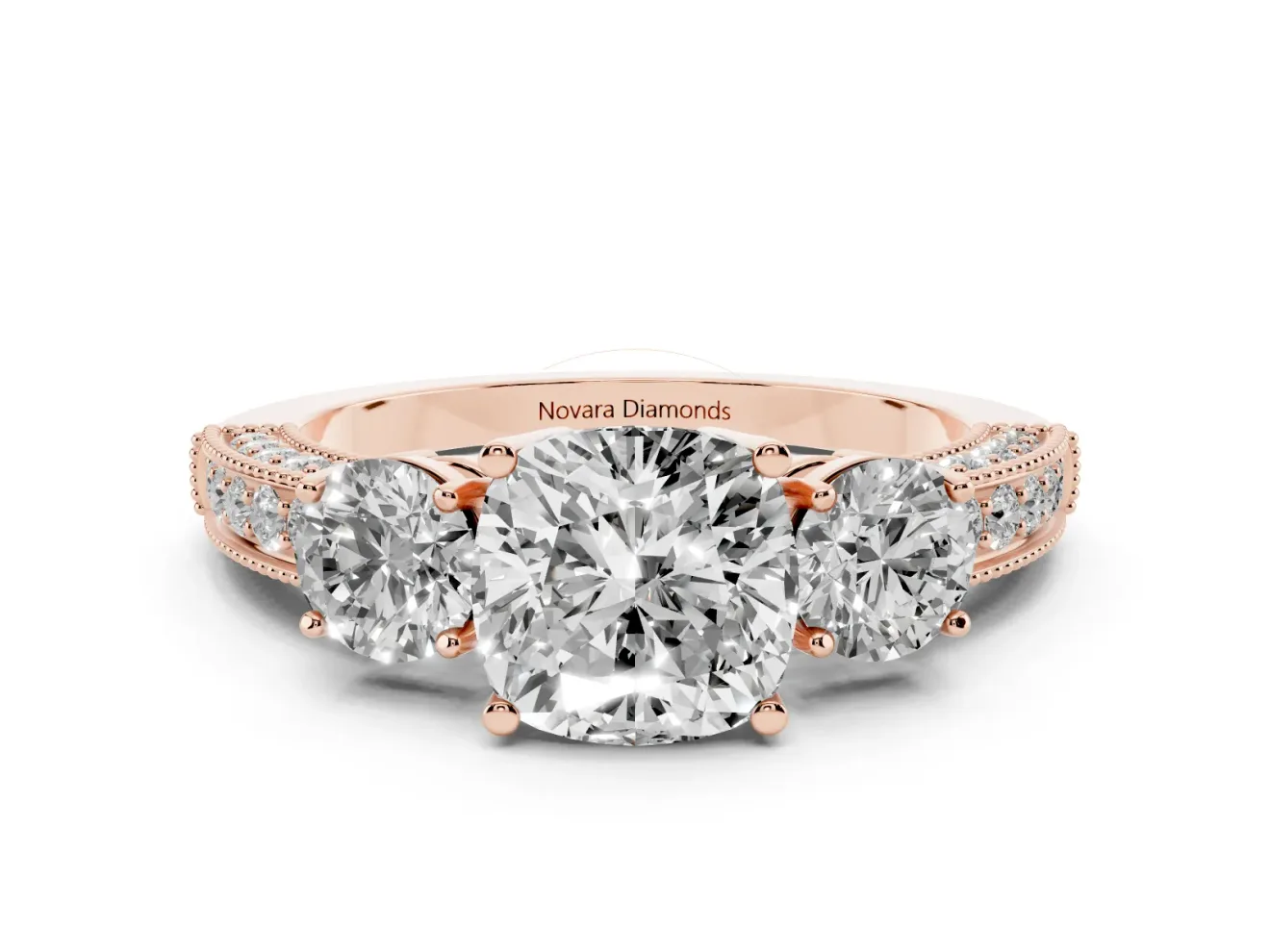 Cushion Cut Diamond Three-Stone Ring Set in Rose gold with Round Side Stones and Pavé Band
