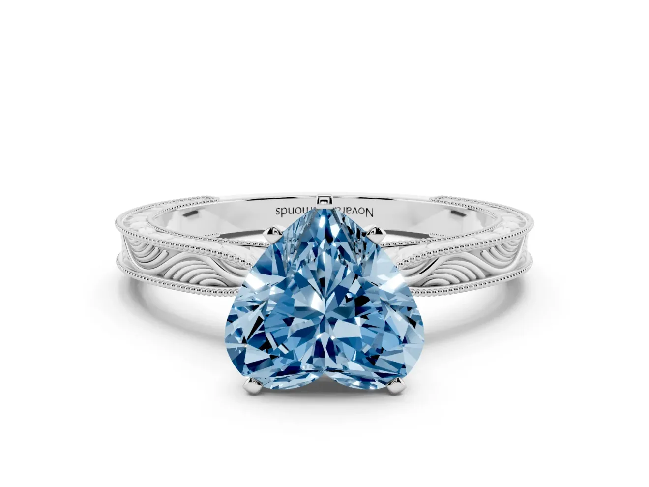 Fancy Blue Heart Cut Diamond Solitaire Milgrain Engraved Band Set in White gold with Prong Setting