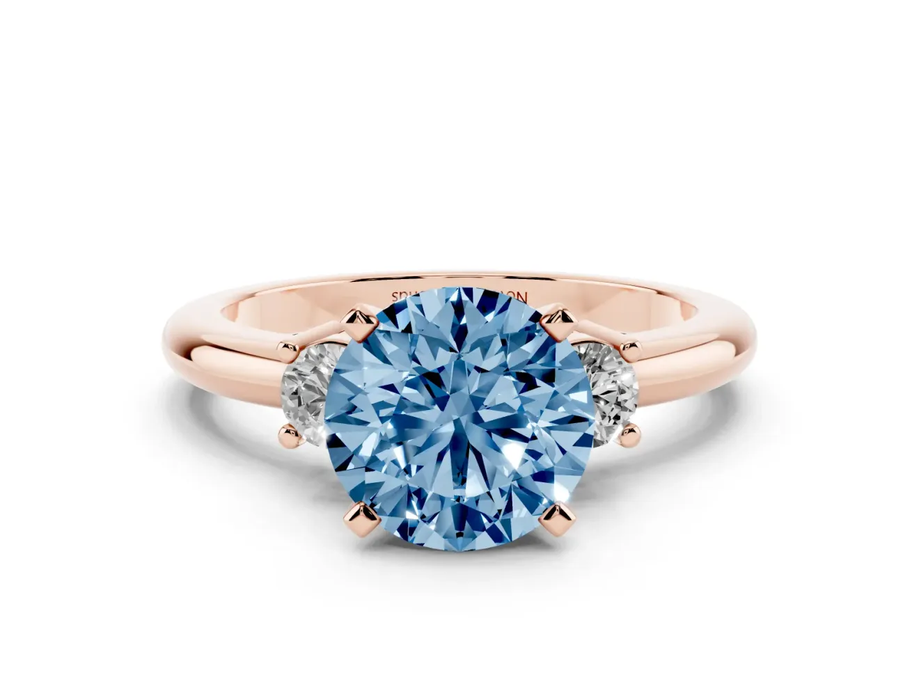 Fancy Blue Three-Stone Round Cut Diamond Ring Set in Rose gold with Prong Setting and Plain Band