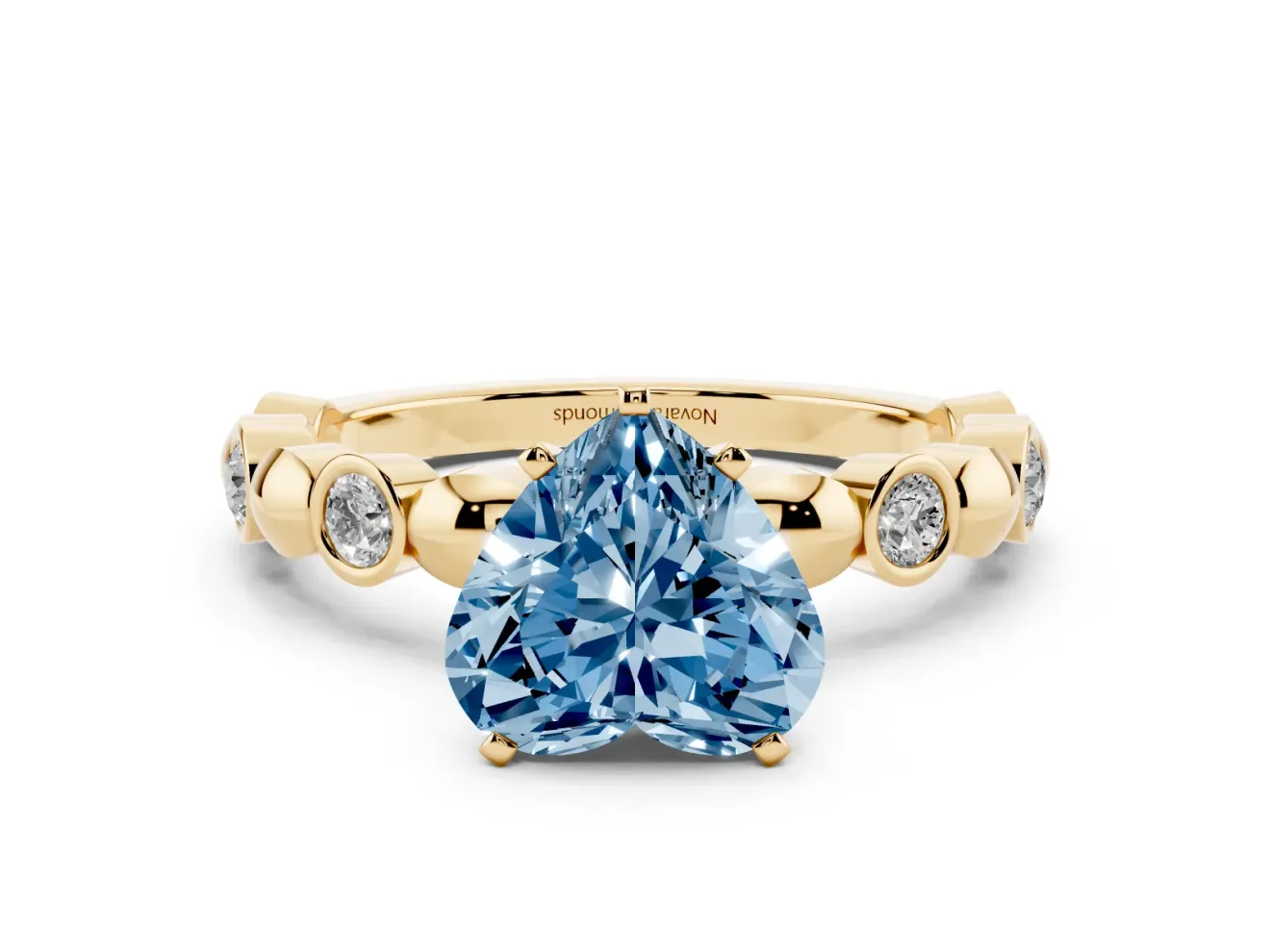 Heart-Shaped Station Engagement Ring Setting for a Fancy Blue Lab-Grown Diamond | Yellow Gold